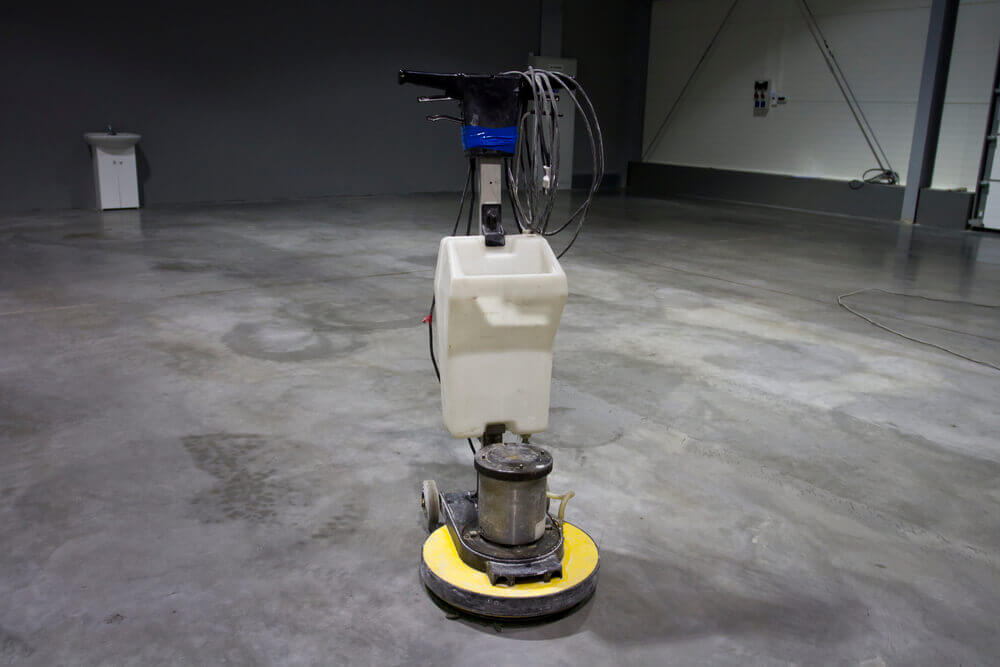 image of concreting Ballarat's polishing machine sitting on a floor that has just been polished with it